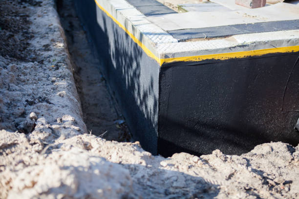 Professional Waterproofing technician working in Londonderry, OH